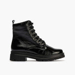 Boot militaire dans la couleur de la femme brevetée noire