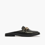 Mule -style women's moccasins with ornament and low black heel