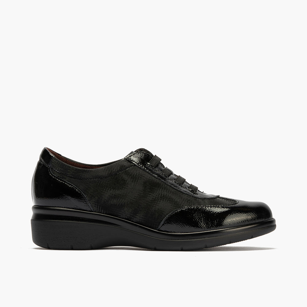 Deportivo elásticos en charol de mujer color negro
