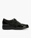 Deportivo elásticos en charol de mujer color negro