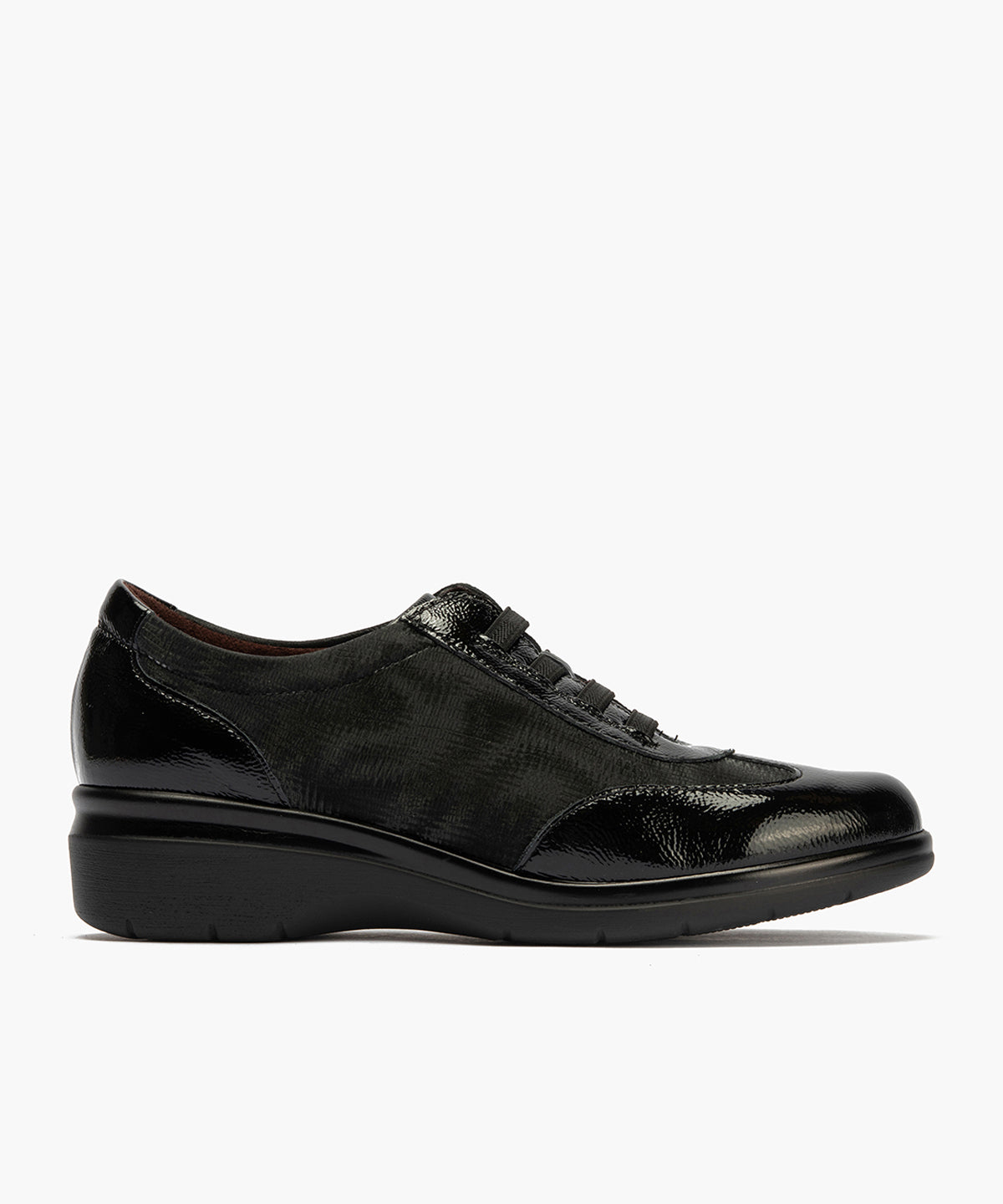 Deportivo elásticos en charol de mujer color negro