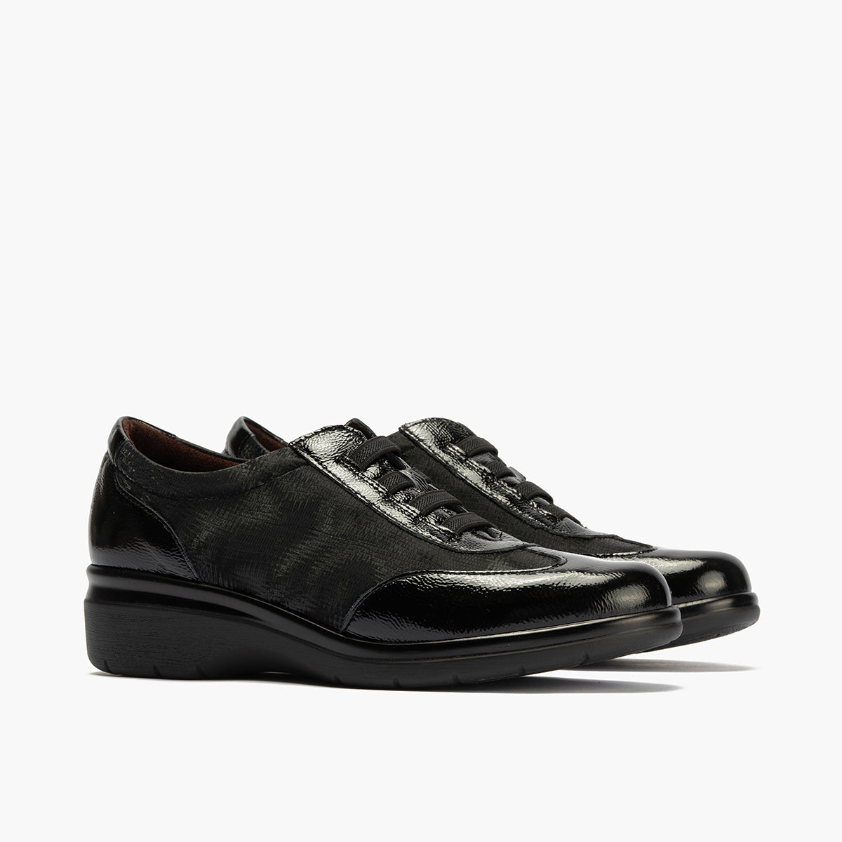 Deportivo elásticos en charol de mujer color negro