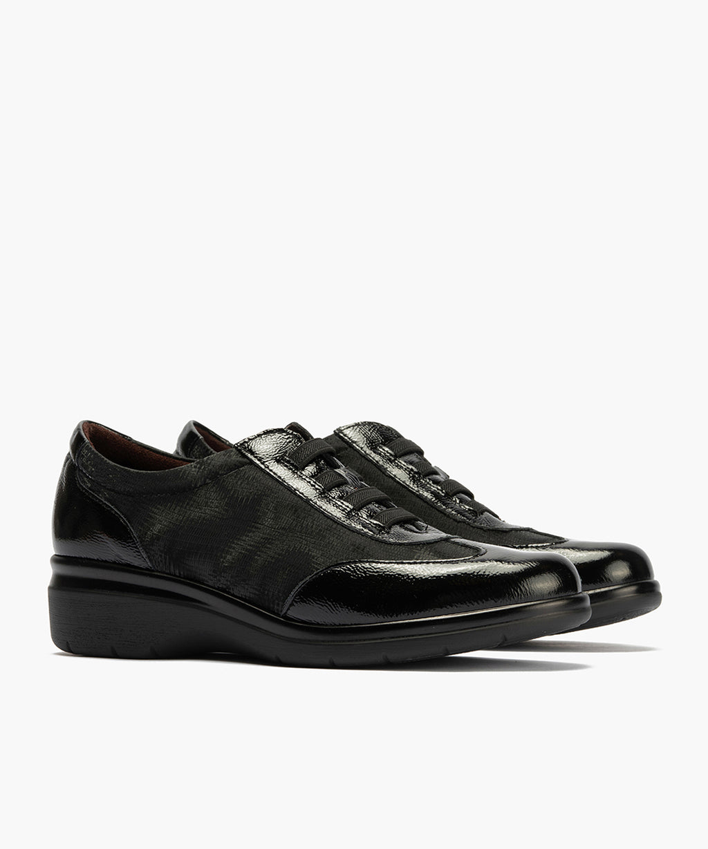 Deportivo elásticos en charol de mujer color negro