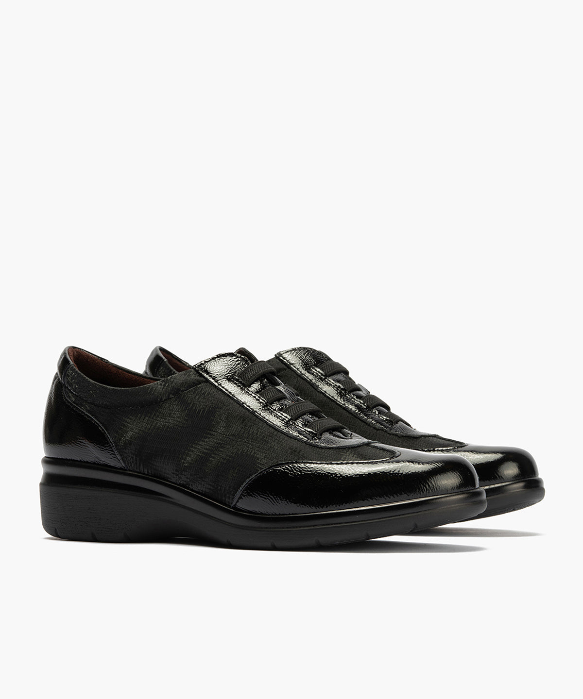 Deportivo elásticos en charol de mujer color negro