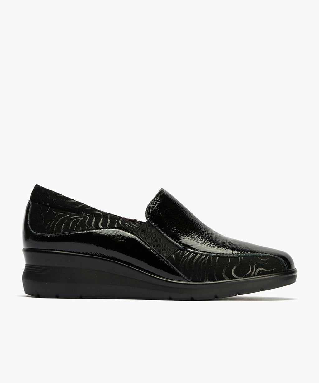 Abotinado Gucci con elásticos de mujer color negro