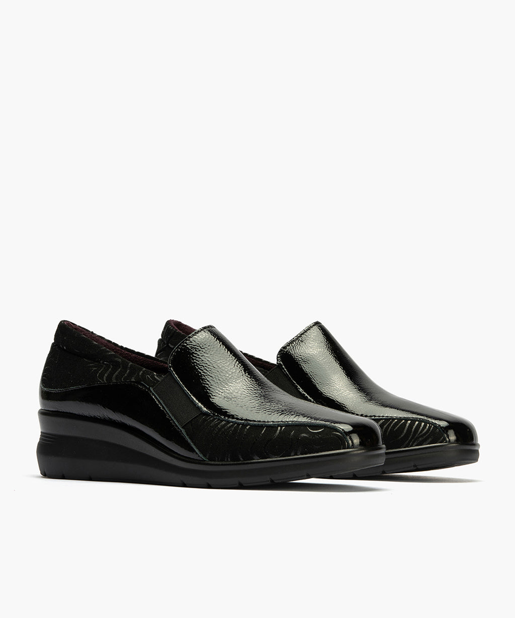 Abotinado Gucci con elásticos de mujer color negro