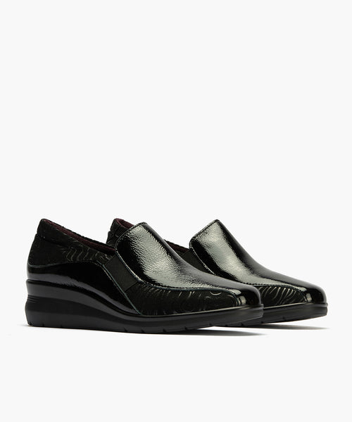 Abotinado Gucci con elásticos de mujer color negro