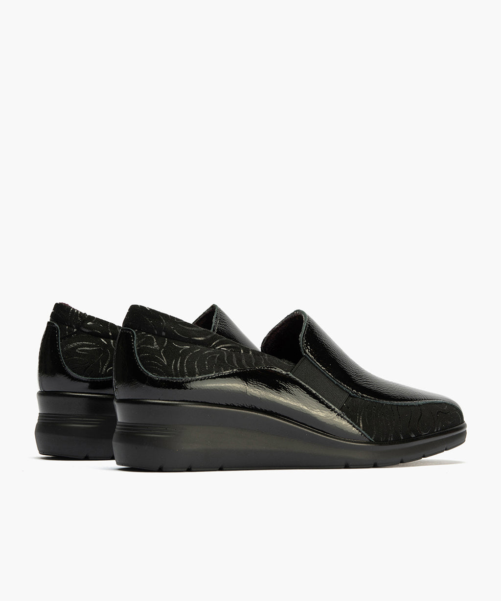 Abotinado Gucci con elásticos de mujer color negro