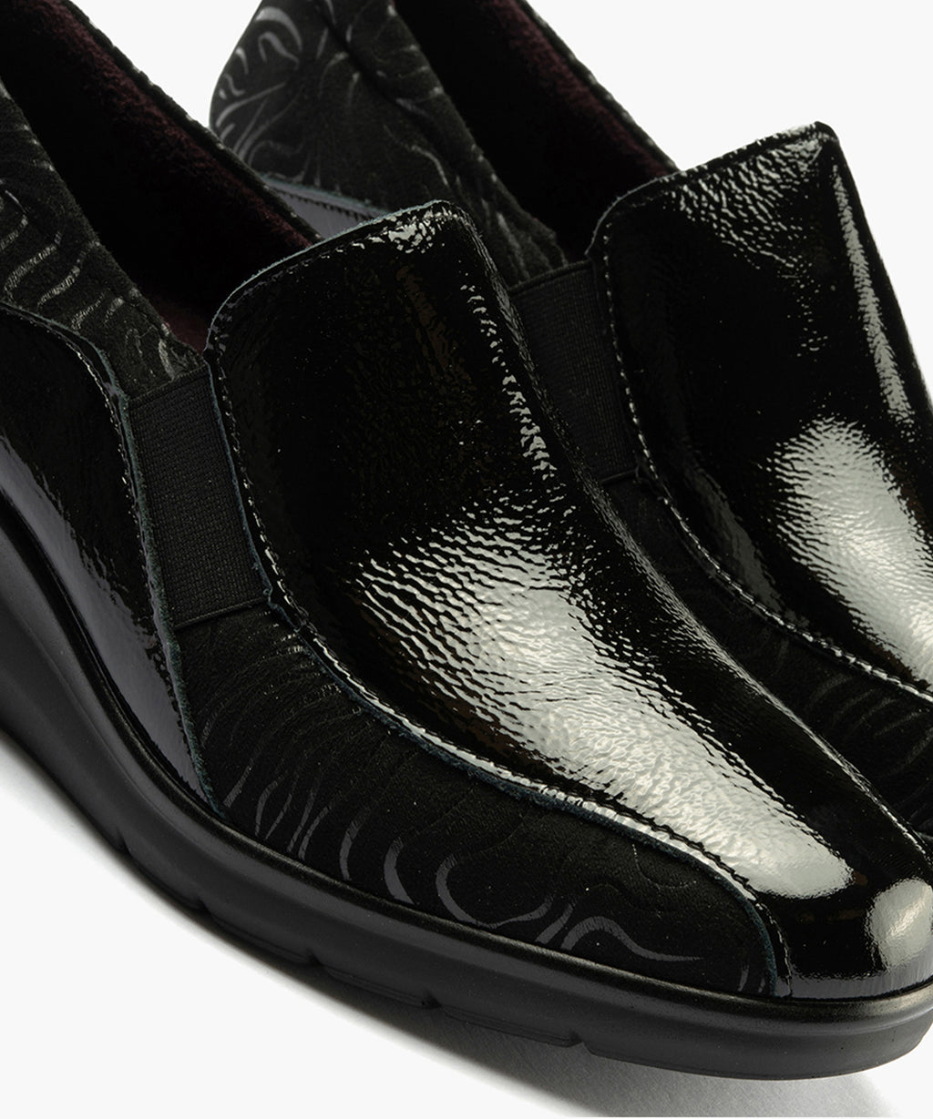 Abotinado Gucci con elásticos de mujer color negro