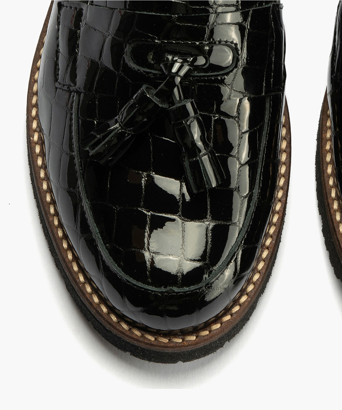 Mocasín en Coco con adorno de mujer color negro