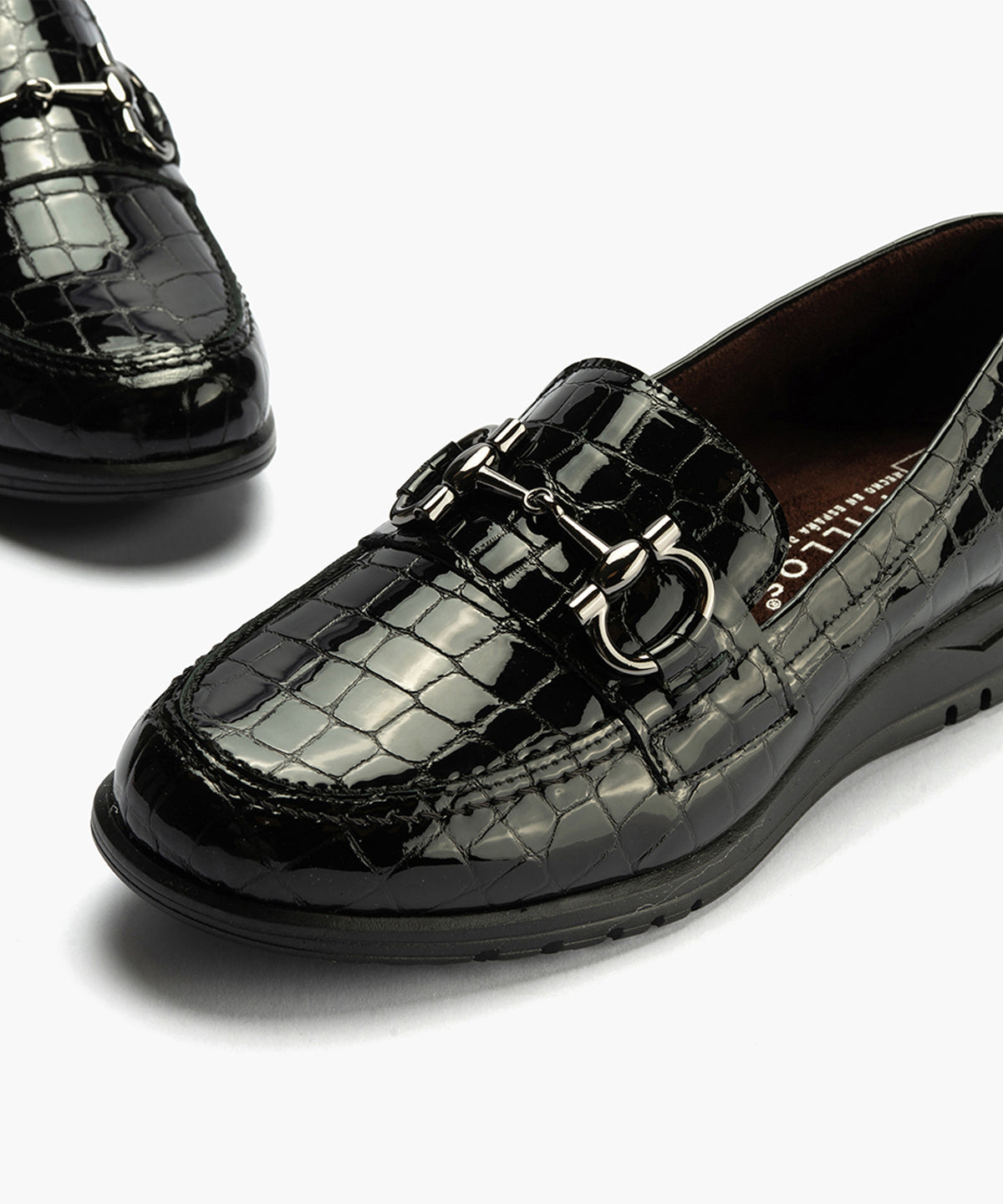 Mocasín en Coco con adorno de mujer color negro