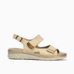 Sandalia plana con doble velcro en piel napa bombeada Crema
