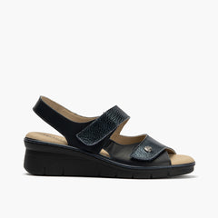 Sandalia plana con velcros en piel napa y piel napa bombeada Marino