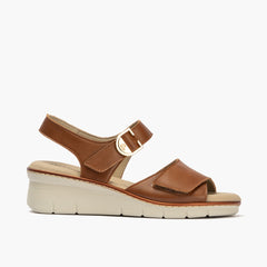 Sandalia con cuña con velcros en piel napa Cuero