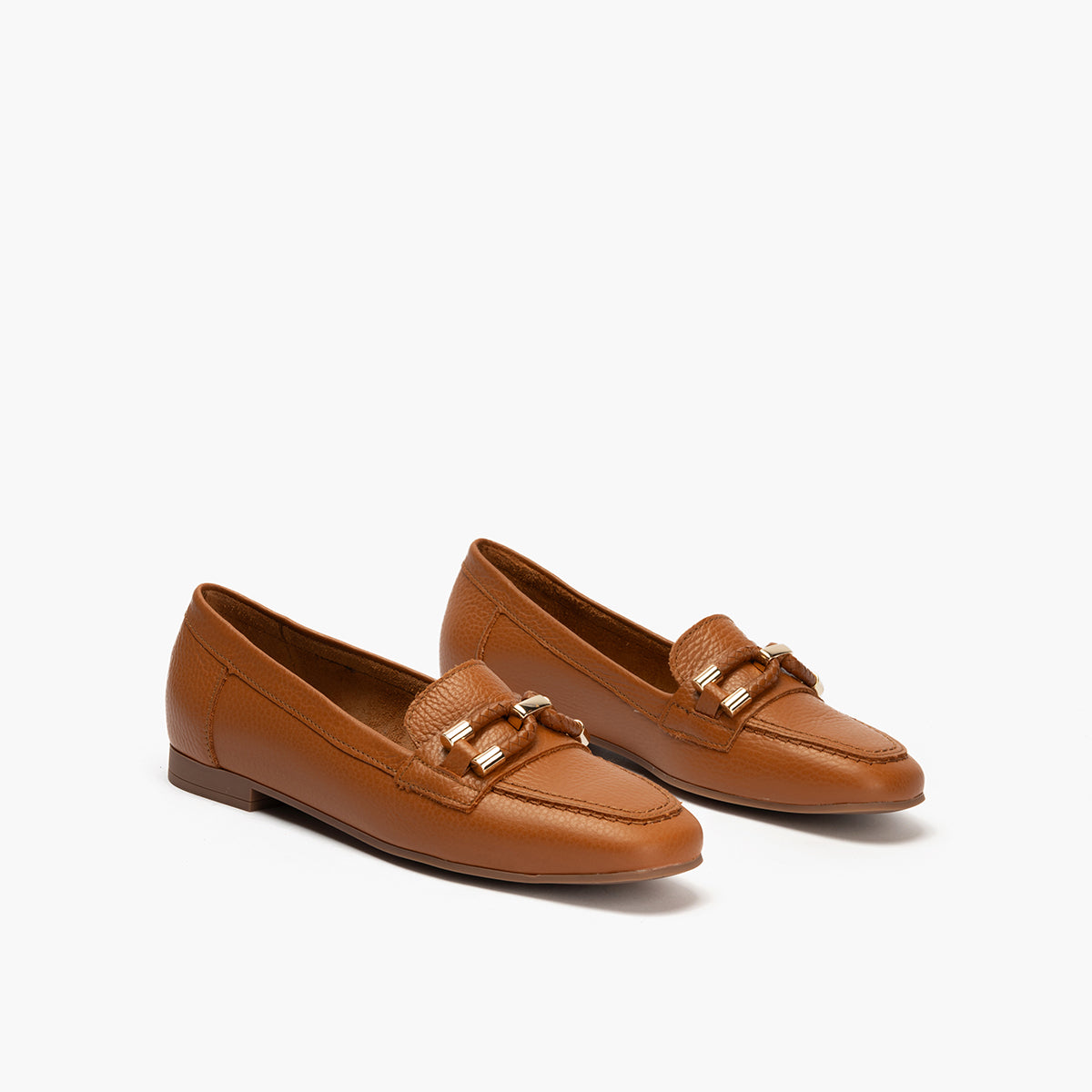 Mocasín plano en piel napa bombeada, con adorno Cuero