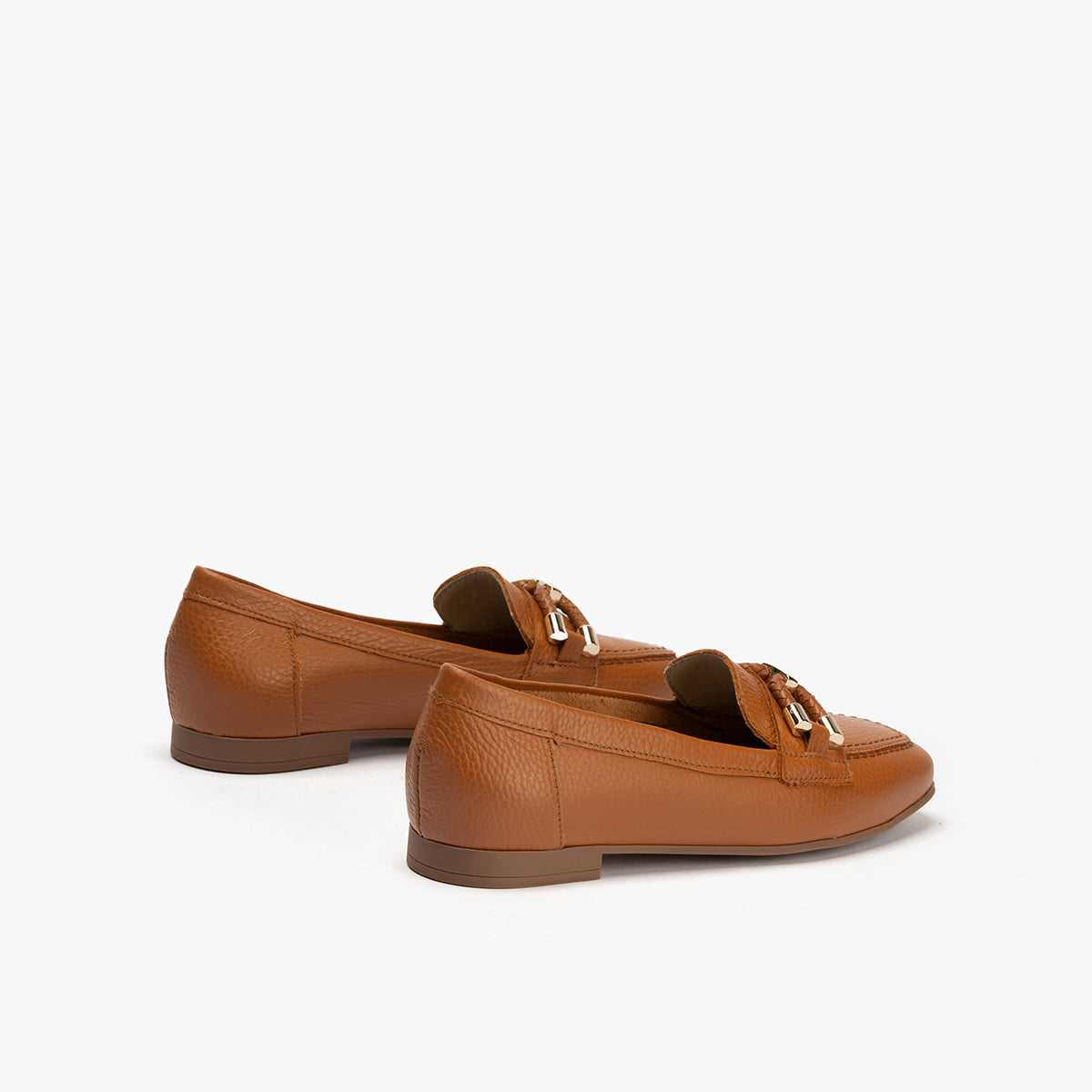 Mocasín plano en piel napa bombeada, con adorno Cuero