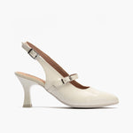Zapato de salón destalonado con tacón alto, punta fina y pulsera Glacial