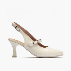 Zapato de salón destalonado con tacón alto, punta fina y pulsera Glacial