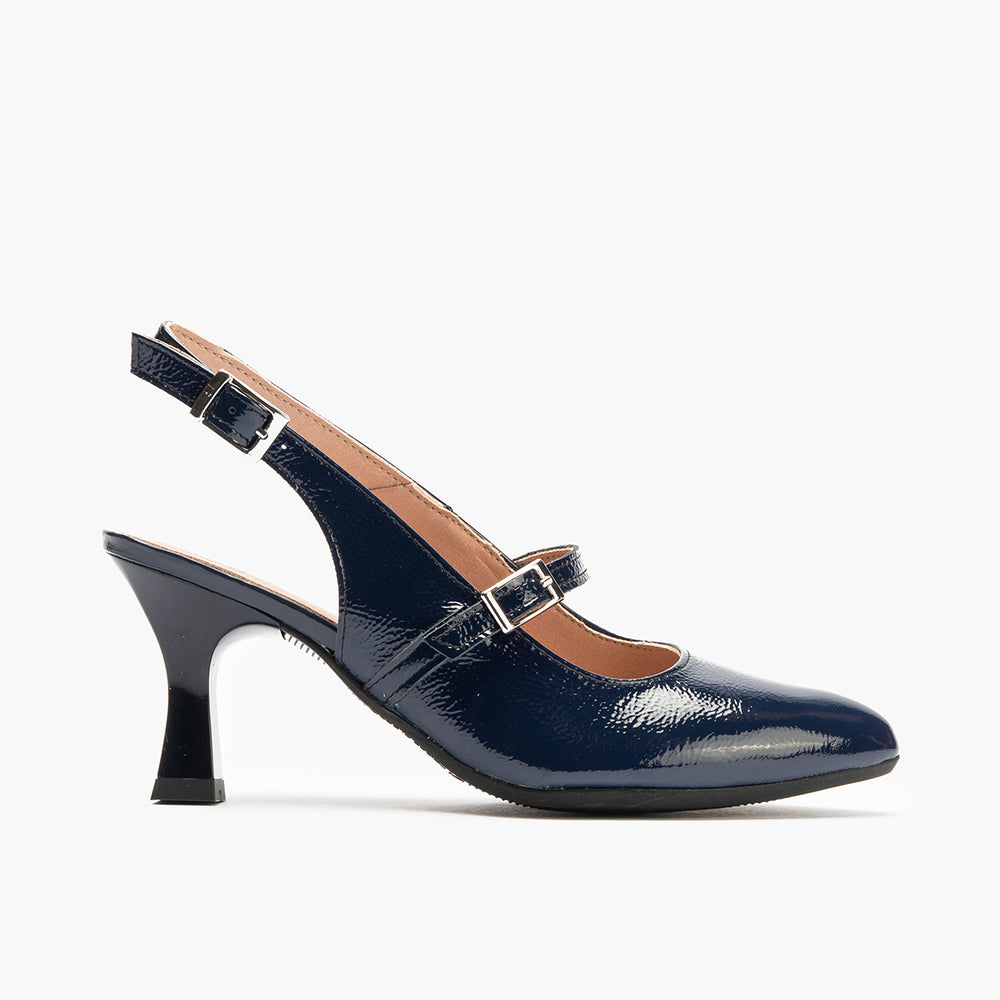 Zapato de salón destalonado con tacón alto, punta fina y pulsera Marino