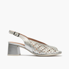 Sandalia destalonada con detalles metalizados y tacón medio Plata