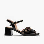 Sandalia con tacón medio, detalles metalizados y pulsera Negro