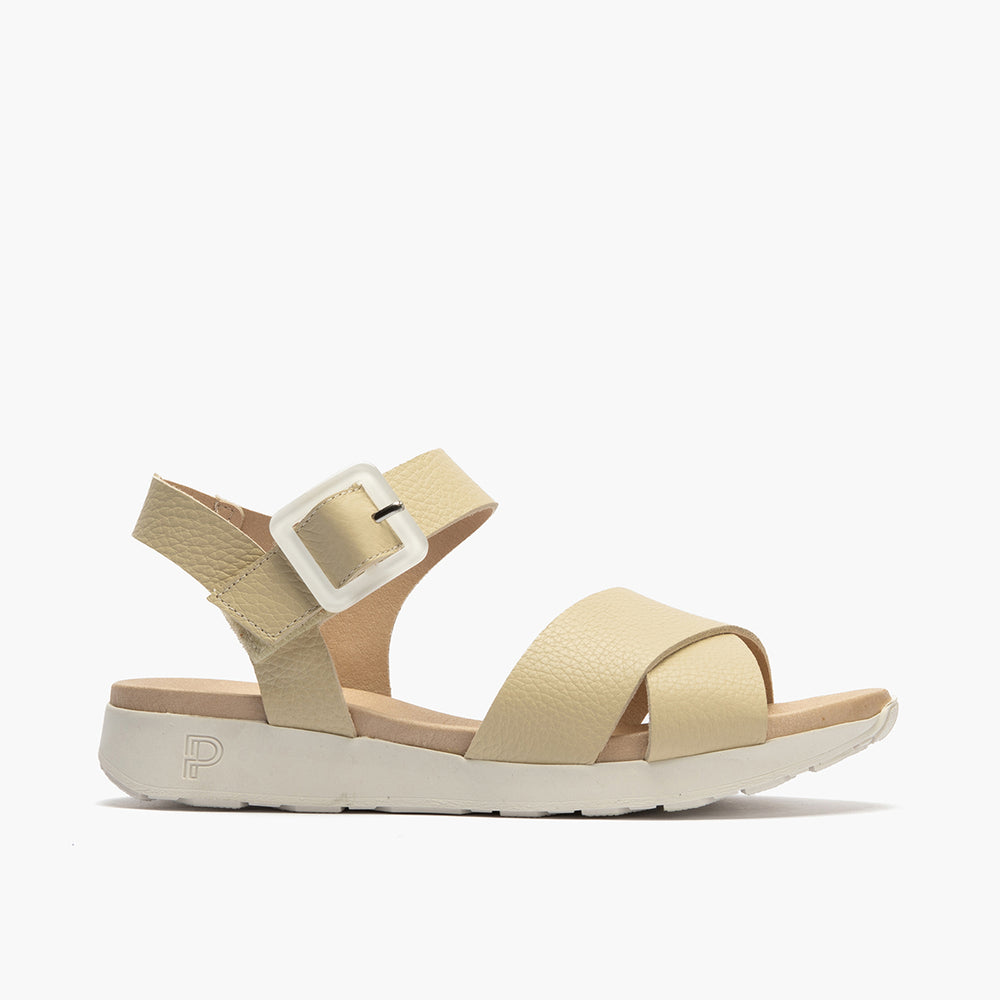 Sandalia deportiva con cruzados y pulsera Crema