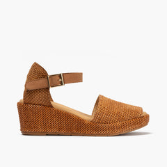 Sandalia de rafia con cuña baja y pulsera Cuero