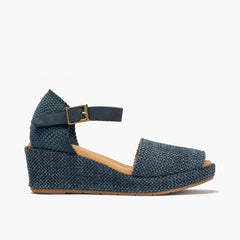 Sandalia de rafia con cuña baja y pulsera Marino