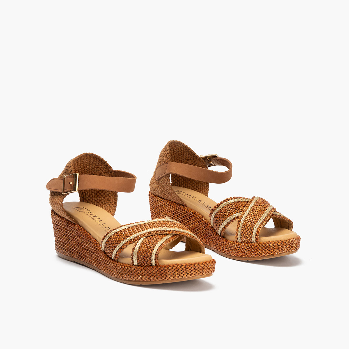 Sandalia de rafia con cuña baja, cruzados y pulsera Cuero
