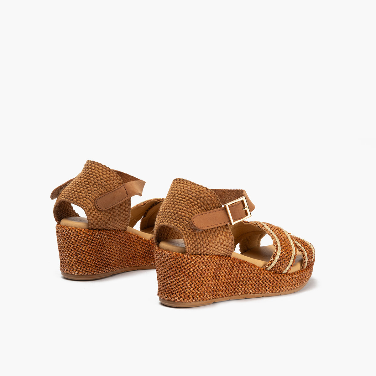 Sandalia de rafia con cuña baja, cruzados y pulsera Cuero