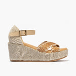 Sandalia de rafia con cuña alta, cruzados y pulsera Cuero