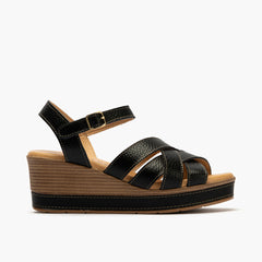 Sandalia con cuña alta, piel y cruzados Negro