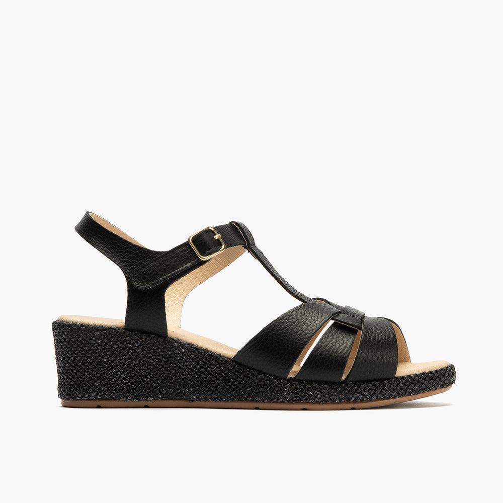 Sandalia estilo valenciana con cuña media y piel Negro
