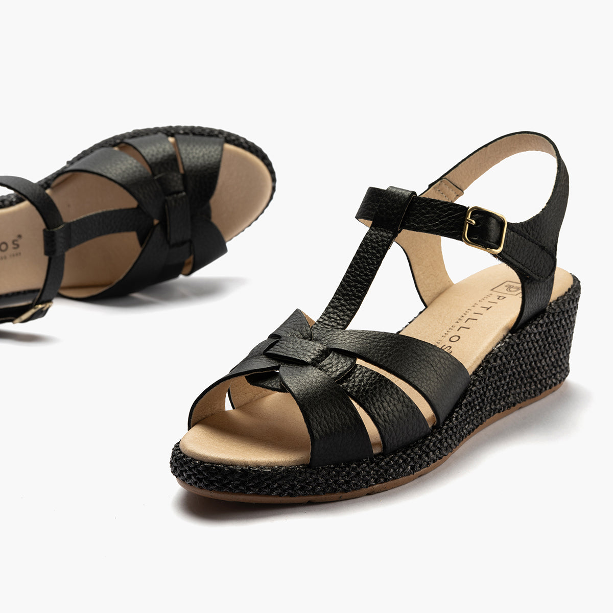 Sandalia estilo valenciana con cuña media y piel Negro
