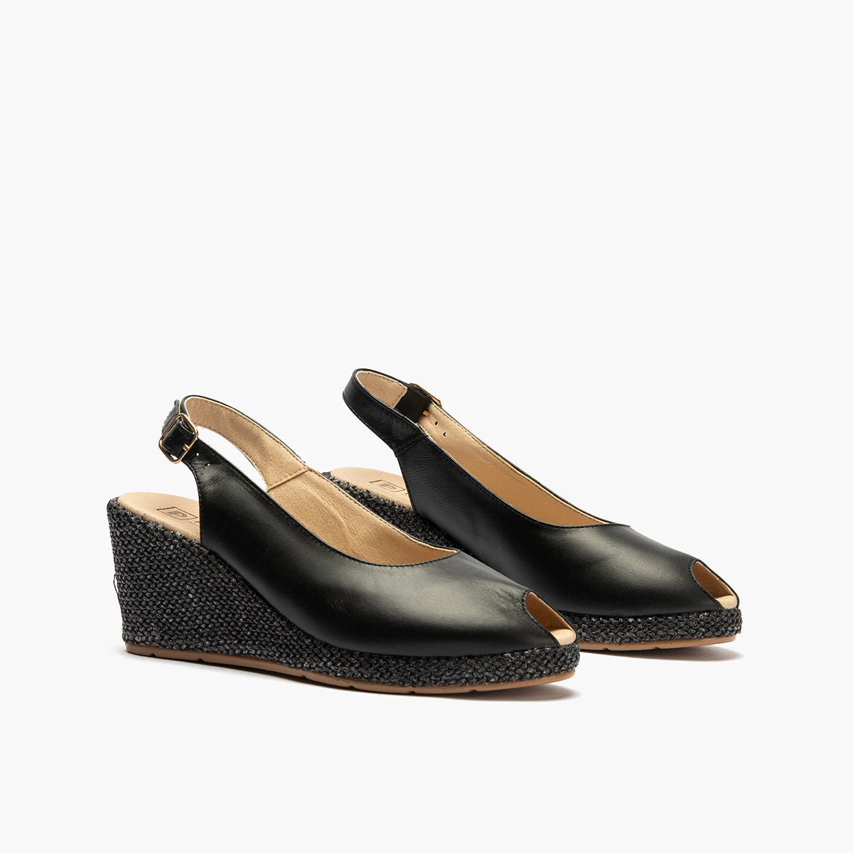 Sandalia estilo valenciana con cuña alta y combinado en piel Negro