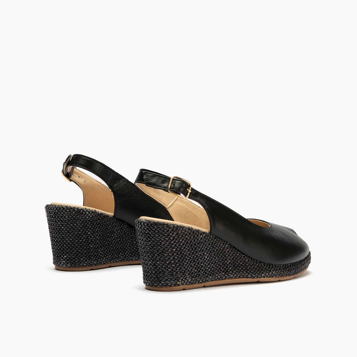 Sandalia estilo valenciana con cuña alta y combinado en piel Negro