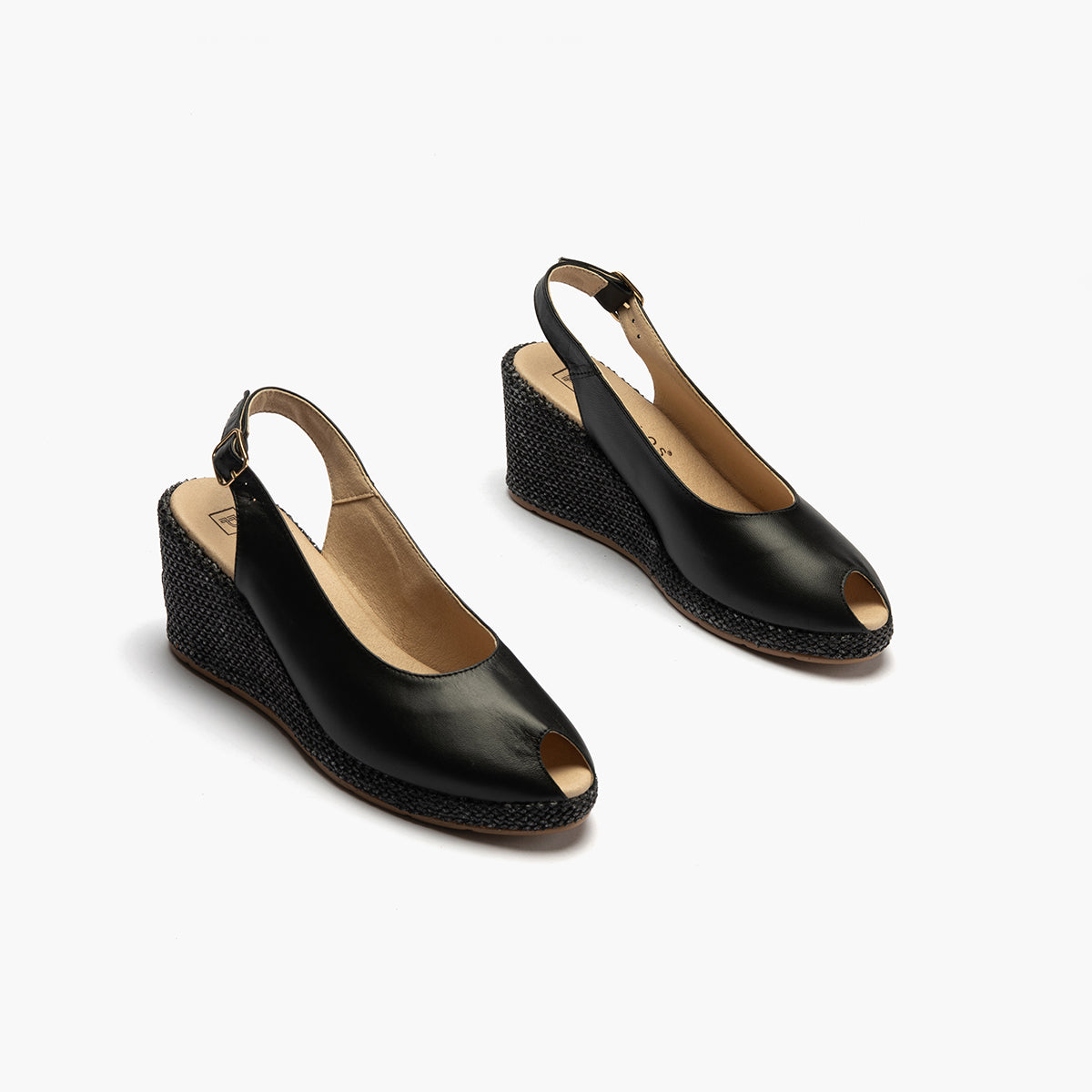 Sandalia estilo valenciana con cuña alta y combinado en piel Negro