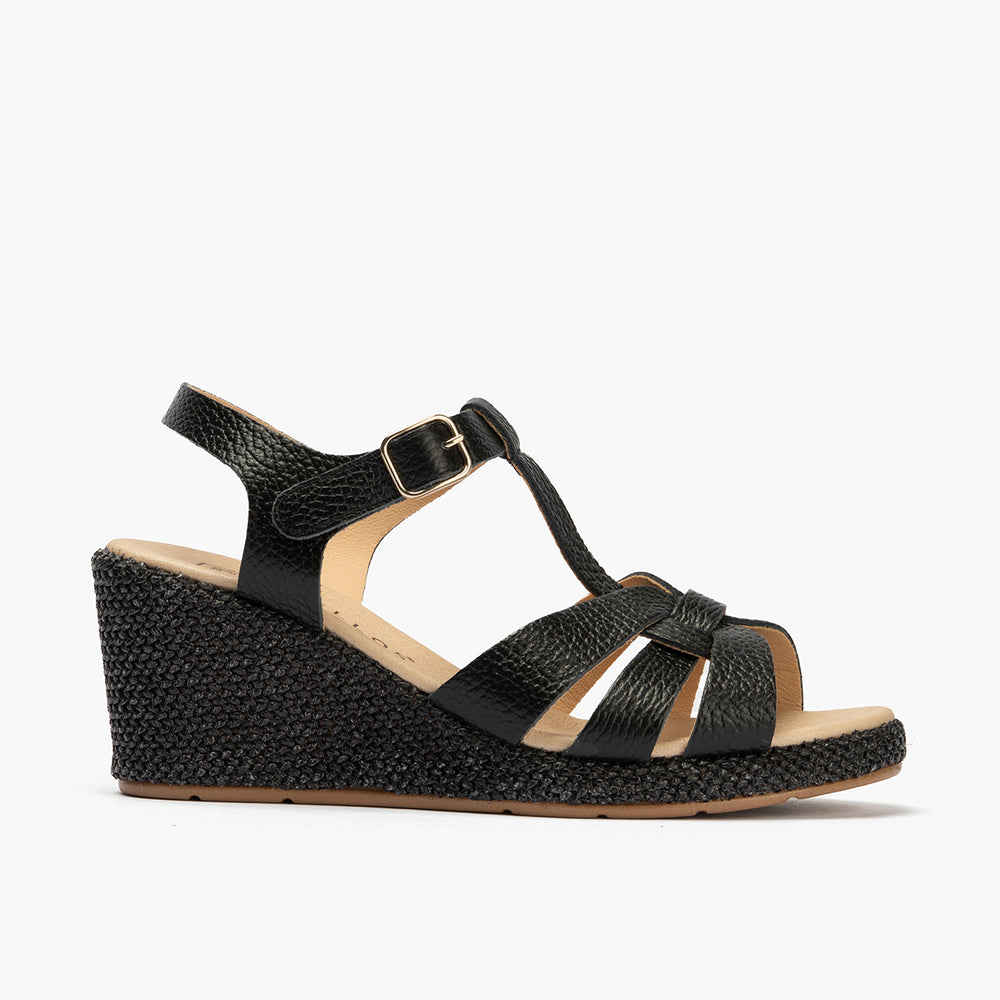 Sandalia estilo valenciana con cuña alta y combinado en piel Negro