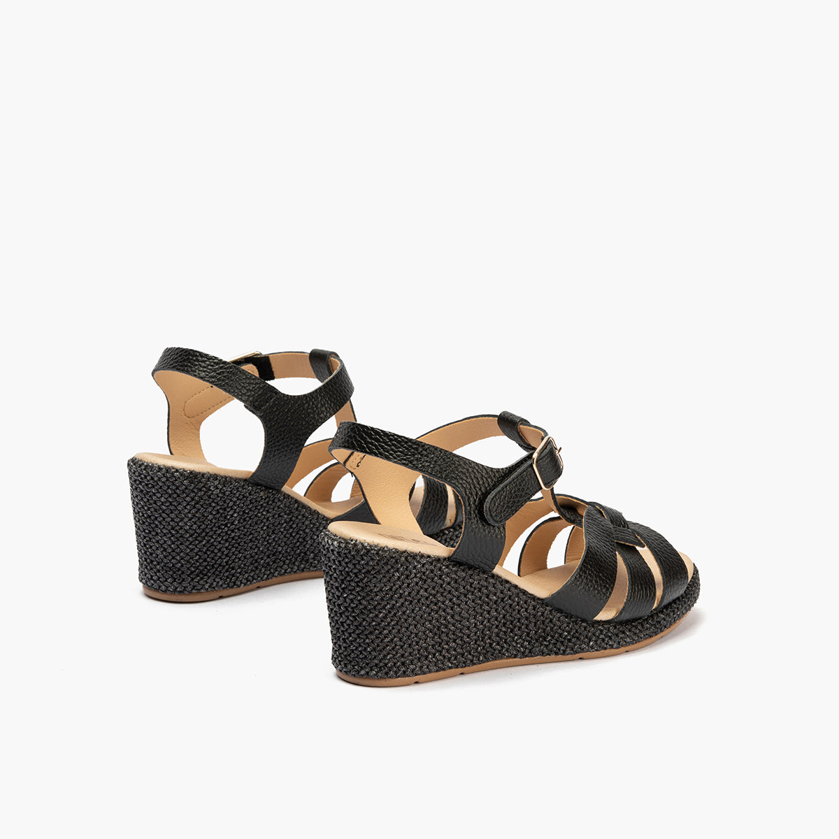 Sandalia estilo valenciana con cuña alta y combinado en piel Negro