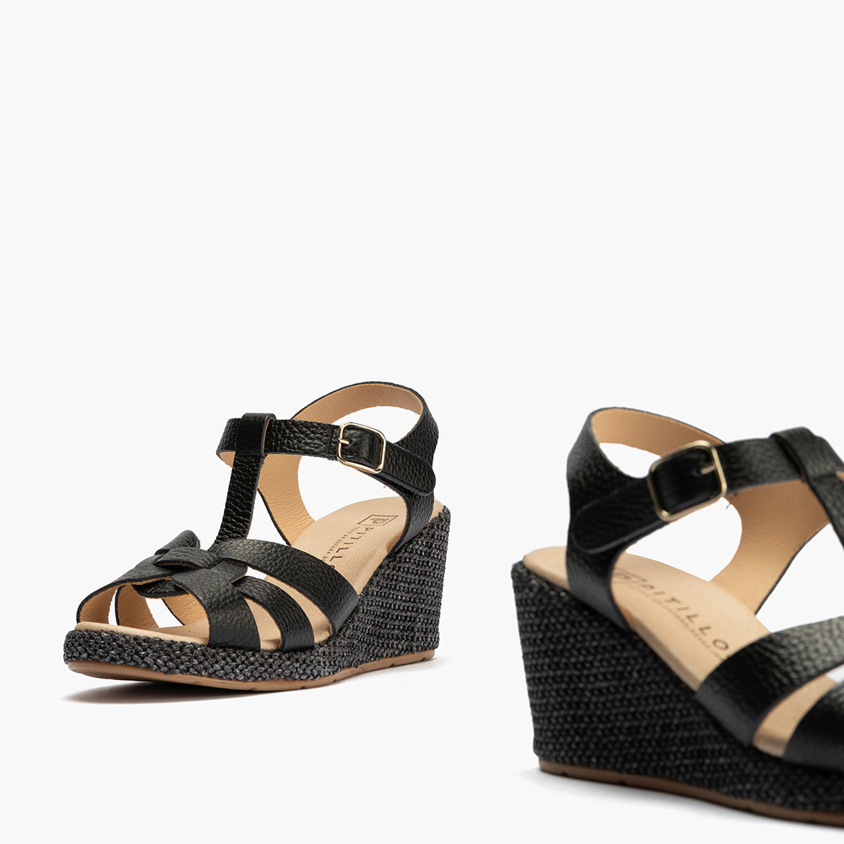 Sandalia estilo valenciana con cuña alta y combinado en piel Negro