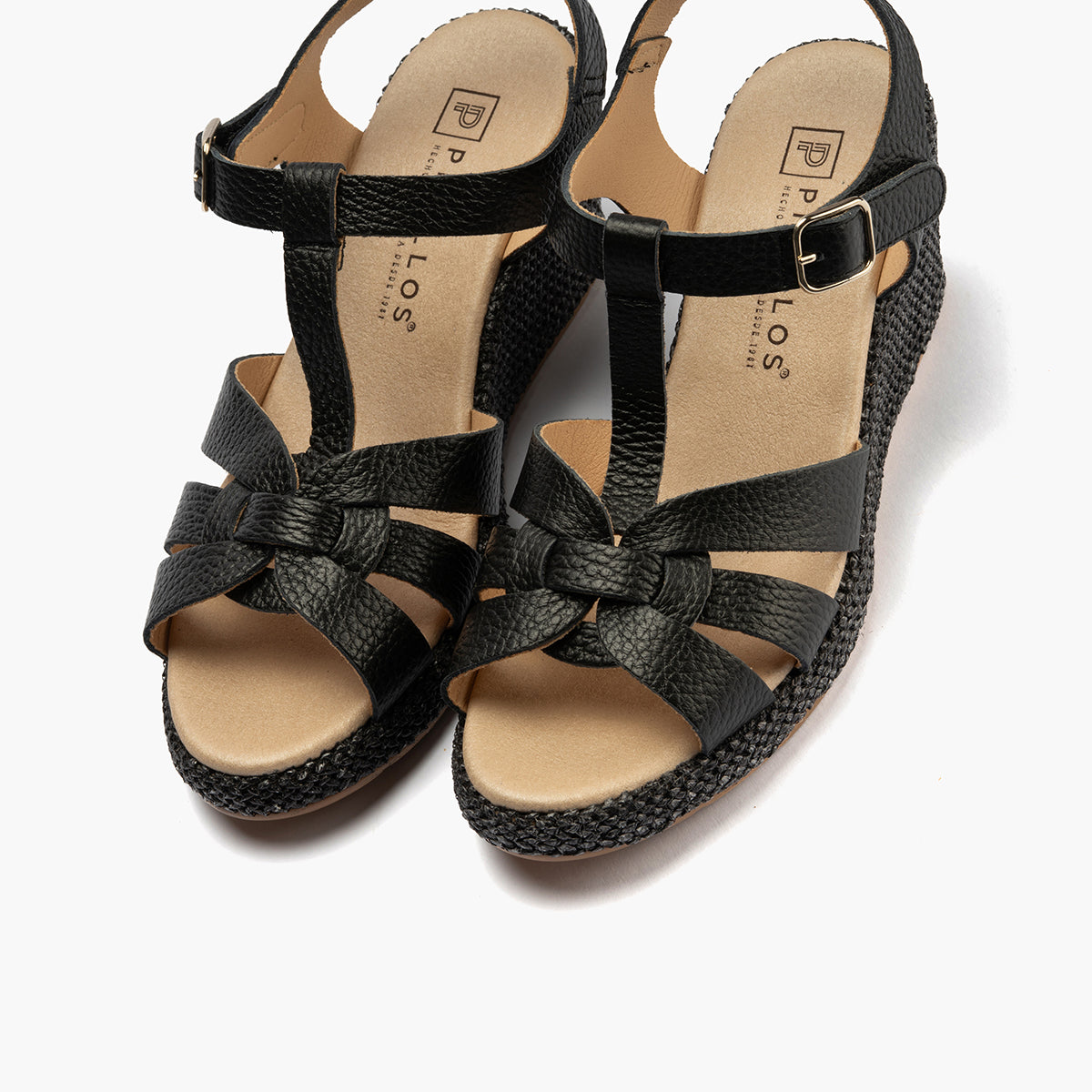 Sandalia estilo valenciana con cuña alta y combinado en piel Negro
