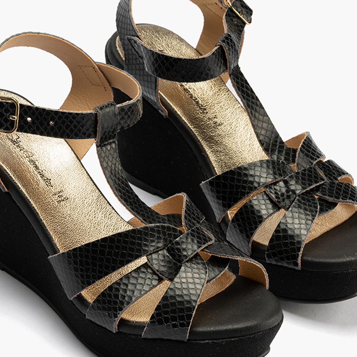 Sandalia con cuña alta en piel con efecto animal print Negro