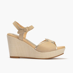 Sandalia con cuña alta en piel napa Crema