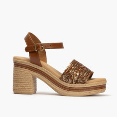 Sandalia con tacón alto en piel laminada y piel napa Cuero