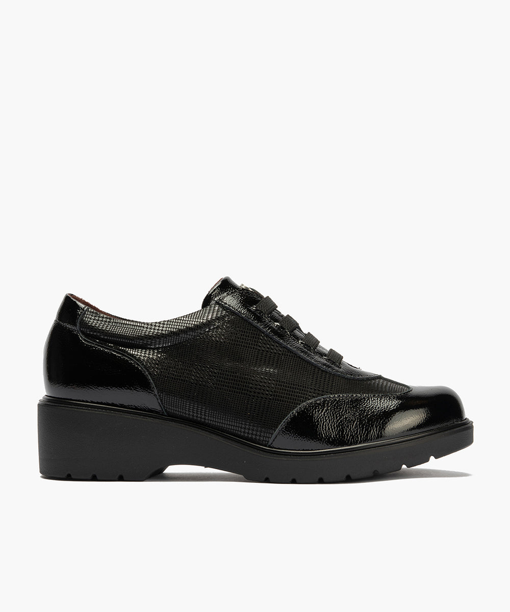 Deportivo con eláticos combinado charol con lycra Negro