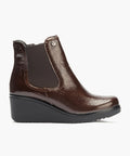 Botín chelsea en charol Marrón